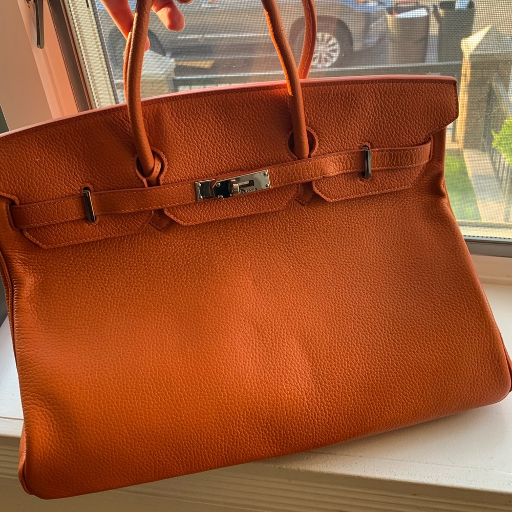 Large orange pocketbook